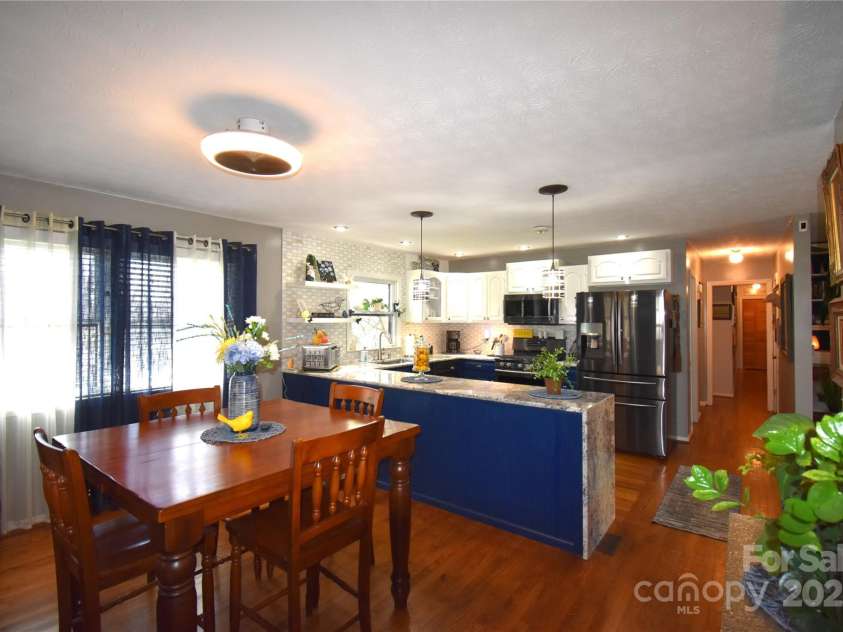 37 Hillside Drive, Etowah, NC 28729.  MLS# CAR4243156, YatesRealty ID 8761. Dining to kitchen