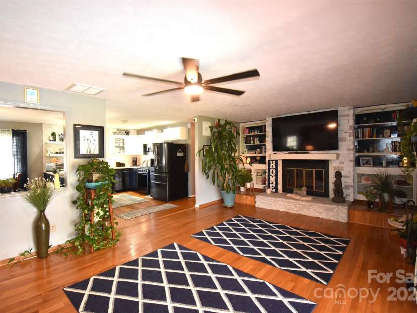 37 Hillside Drive, Etowah, NC 28729.  MLS# CAR4243156, YatesRealty ID 8761. Living room looking to kitchen