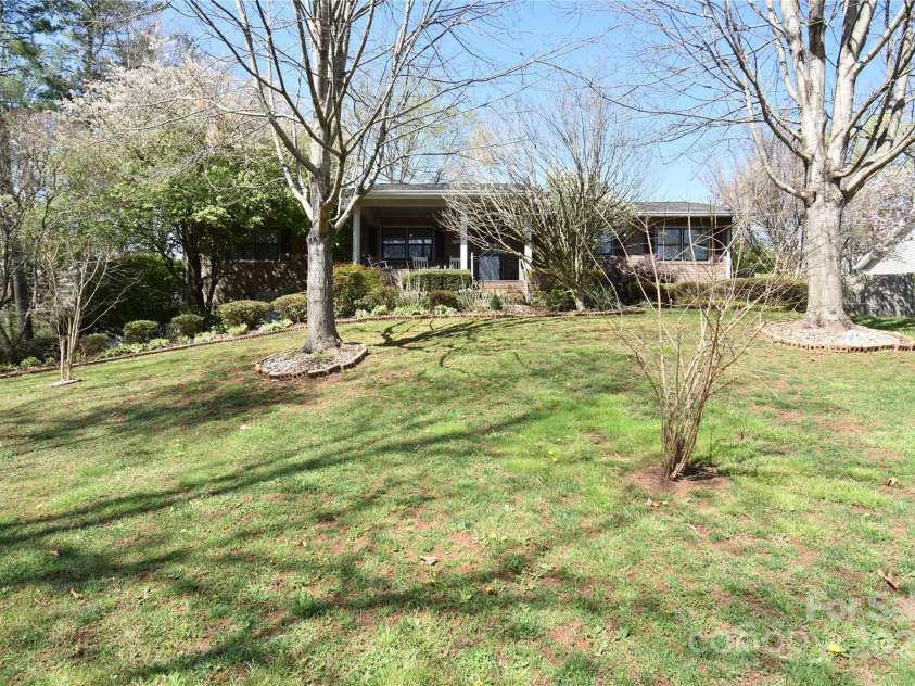 37 Hillside Drive, Etowah, NC 28729.  MLS# CAR4243156, YatesRealty ID 8761. Perched on a knoll