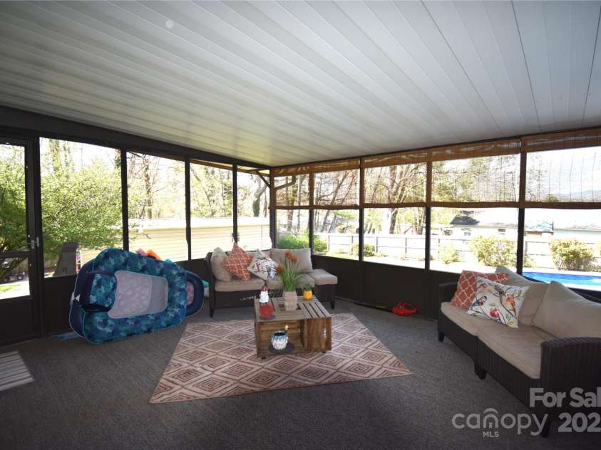 37 Hillside Drive, Etowah, NC 28729.  MLS# CAR4243156, YatesRealty ID 8761. Screened in porch
