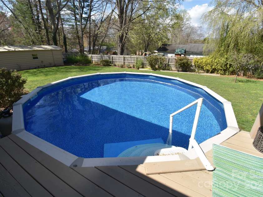 37 Hillside Drive, Etowah, NC 28729.  MLS# CAR4243156, YatesRealty ID 8761. Step right into your refreshing pool