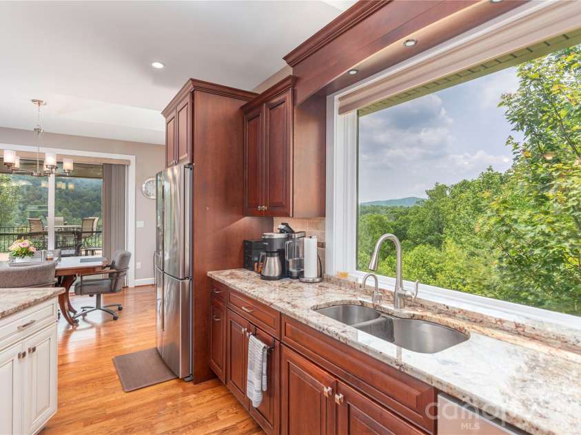 930 Big Raven Lane, Saluda, NC 28773.  MLS# CAR4270163, YatesRealty ID 8761. Enjoy the views from the kitchen sink