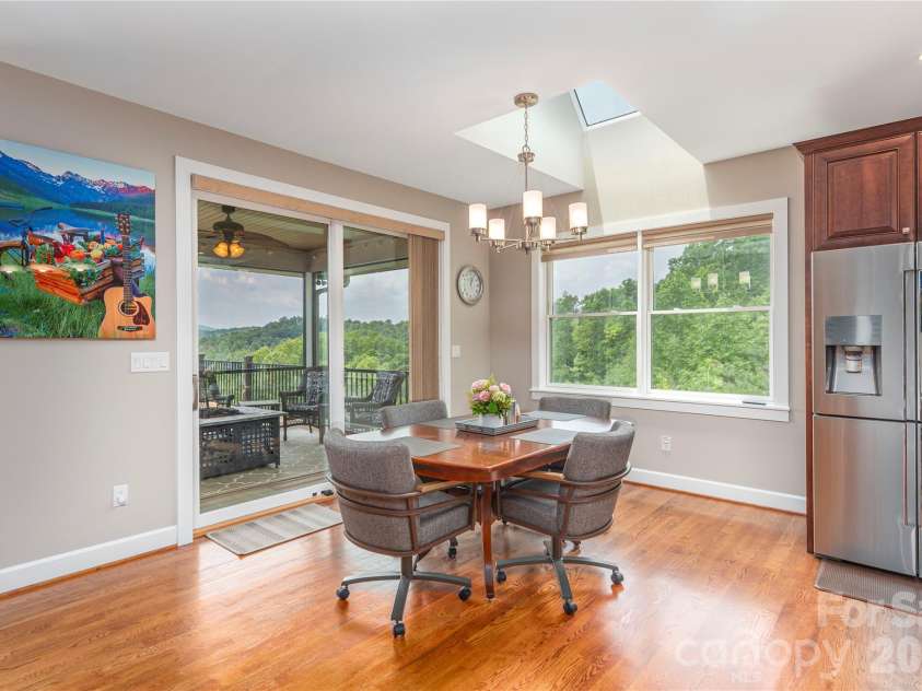 930 Big Raven Lane, Saluda, NC 28773.  MLS# CAR4270163, YatesRealty ID 8761. Hardwood floors add warmth to the main living area