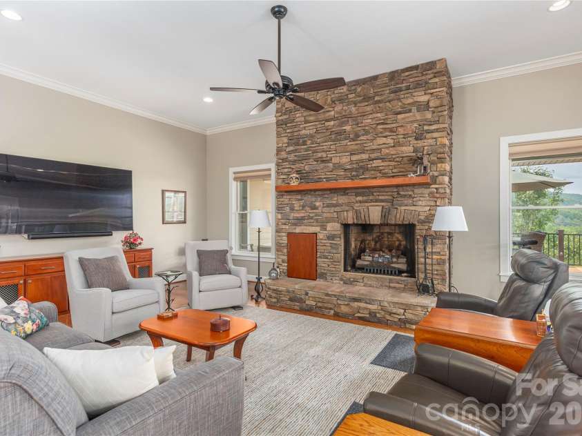 930 Big Raven Lane, Saluda, NC 28773.  MLS# CAR4270163, YatesRealty ID 8761. Vaulted ceilings provide a luxurious experience in the living room and beyond