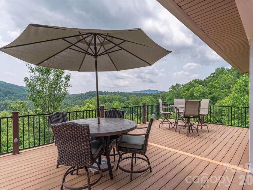 930 Big Raven Lane, Saluda, NC 28773.  MLS# CAR4270163, YatesRealty ID 8761. Year-round mountain views and epic sunsets experienced here.