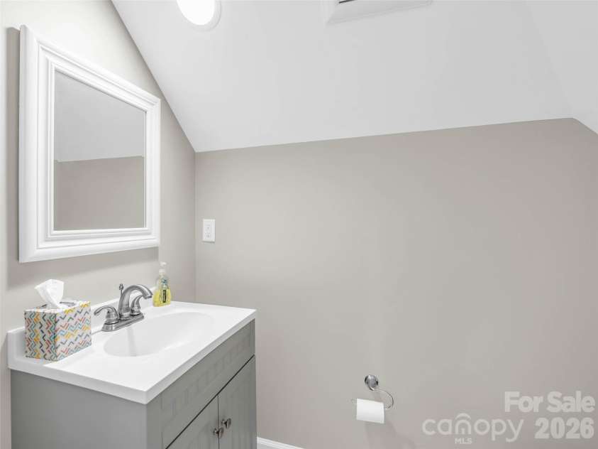 930 Big Raven Lane, Saluda, NC 28773.  MLS# CAR4405808, YatesRealty ID 8761. 1/2 bath upstairs