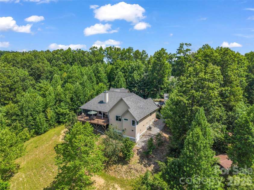 930 Big Raven Lane, Saluda, NC 28773.  MLS# CAR4405808, YatesRealty ID 8761. Back side view