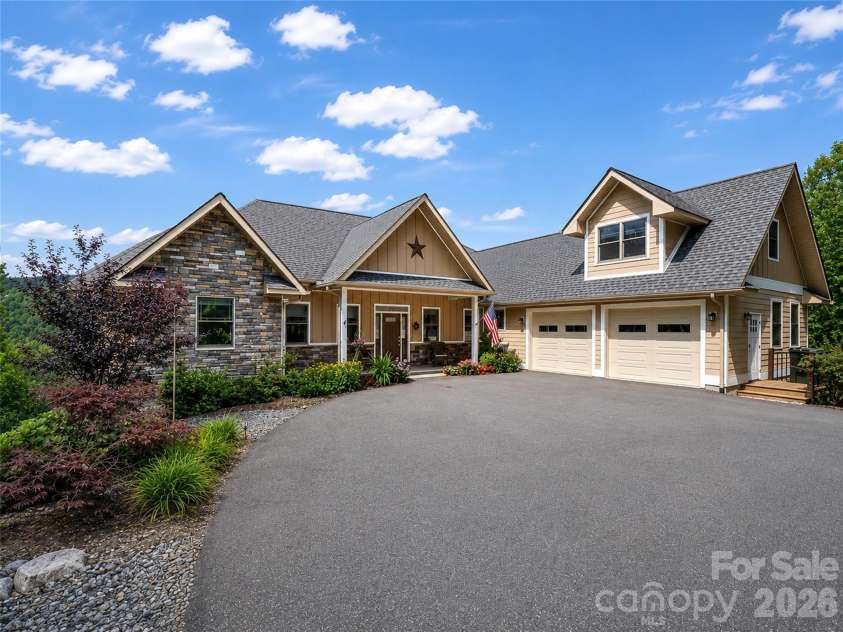 930 Big Raven Lane, Saluda, NC 28773.  MLS# CAR4405808, YatesRealty ID 8761. Front of house