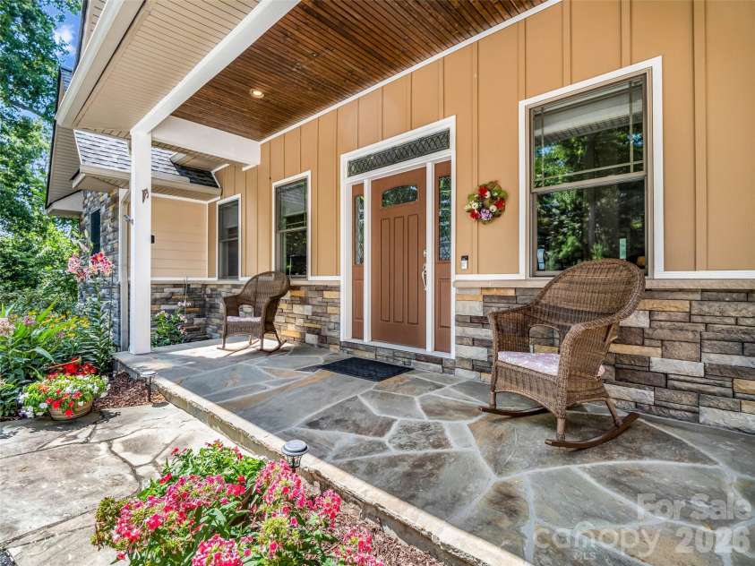 930 Big Raven Lane, Saluda, NC 28773.  MLS# CAR4405808, YatesRealty ID 8761. Front porch