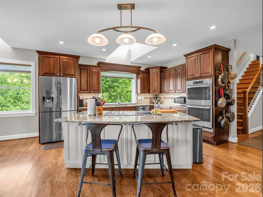 930 Big Raven Lane, Saluda, NC 28773.  MLS# CAR4405808, YatesRealty ID 8761. Kitchen Island view