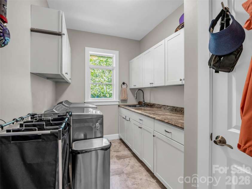 930 Big Raven Lane, Saluda, NC 28773.  MLS# CAR4405808, YatesRealty ID 8761. Laundry Area
