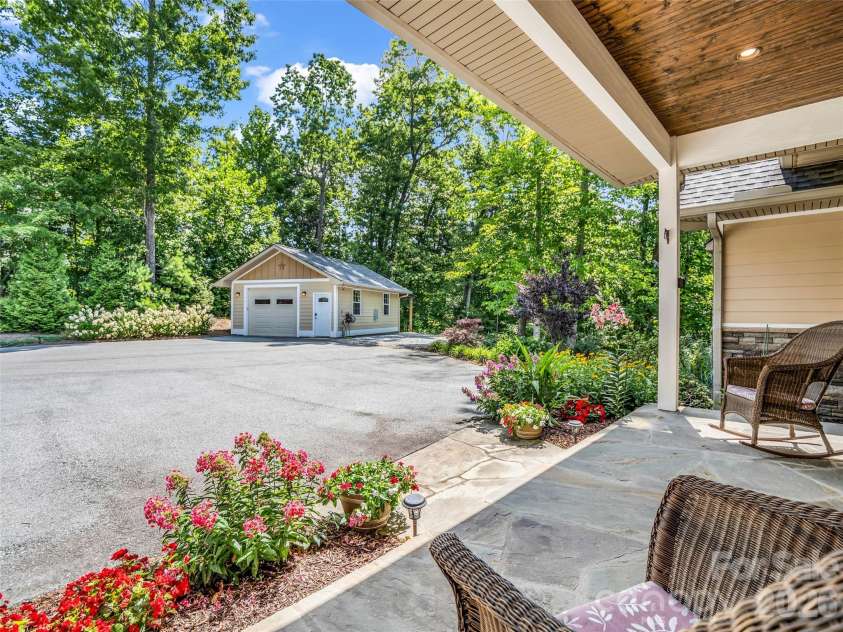 930 Big Raven Lane, Saluda, NC 28773.  MLS# CAR4405808, YatesRealty ID 8761. Looking from front porch