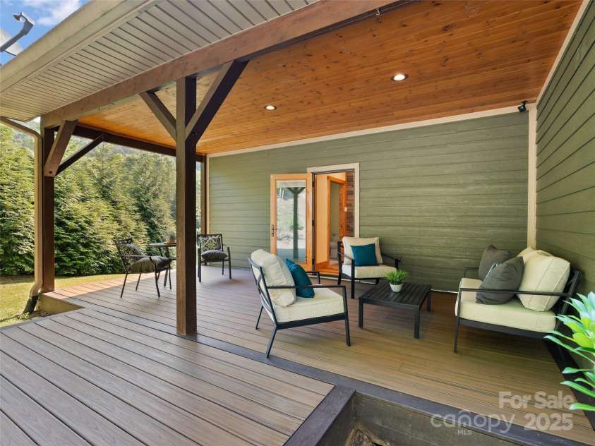 350 Inverness Drive, Waynesville, NC 28785.  MLS# CAR4207802, YatesRealty ID 8767. Back Deck set up for a hot tub off the Primary Bedroom