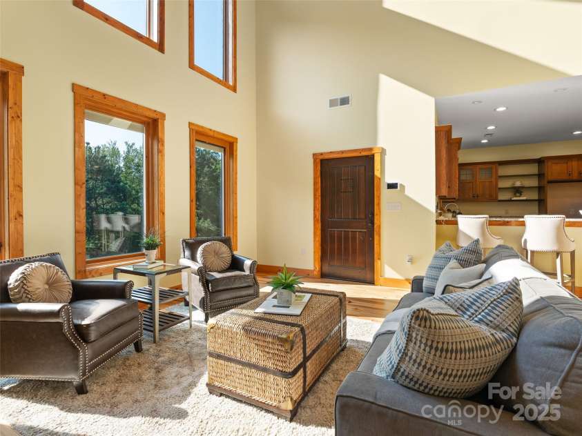 350 Inverness Drive, Waynesville, NC 28785.  MLS# CAR4207802, YatesRealty ID 8767. Lot on natural light from the wall of windows