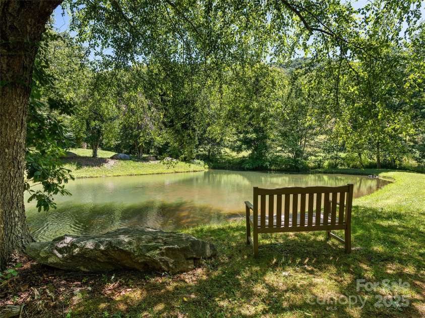 350 Inverness Drive, Waynesville, NC 28785.  MLS# CAR4207802, YatesRealty ID 8767. Pond by entrance to property