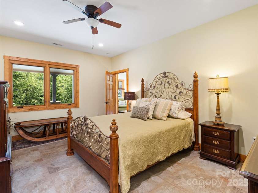 350 Inverness Drive, Waynesville, NC 28785.  MLS# CAR4207802, YatesRealty ID 8767. Terrace primary suite with walk-in closet