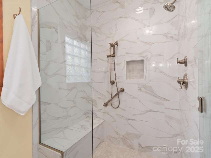 350 Inverness Drive, Waynesville, NC 28785.  MLS# CAR4207802, YatesRealty ID 8767. Zero entry primary shower