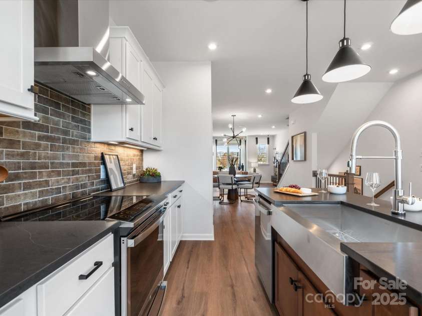 5516 Swaling Street, Charlotte, NC 28217.  MLS# CAR4318946, YatesRealty ID 8768. Crisp White Cabinetry and Premium Hardware Selections. *Model Photos | Actual Finishes, Structural Selections, and Orientation May Vary.