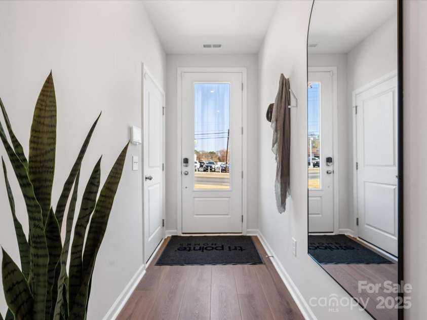 5516 Swaling Street, Charlotte, NC 28217.  MLS# CAR4318946, YatesRealty ID 8768. Front Entry Through 8' Doorway. *Model Photos | Actual Finishes, Structural Selections, and Orientation May Vary.