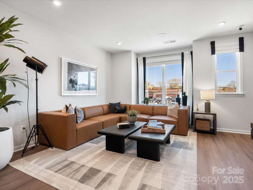 5516 Swaling Street, Charlotte, NC 28217.  MLS# CAR4318946, YatesRealty ID 8768. Great Room Warmed by Natural Light and Featuring 9' Ceilings. *Model Photos | Actual Finishes, Structural Selections, and Orientation May Vary.