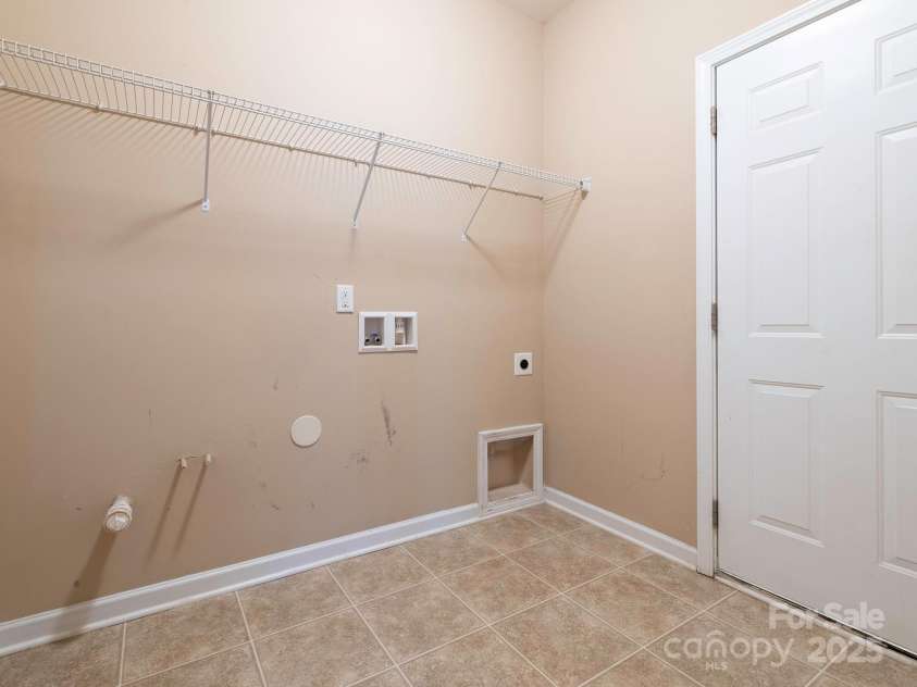 208 Fielding Street, Mount Holly, NC 28120.  MLS# CAR4249578, YatesRealty ID 8769. Laundry Room