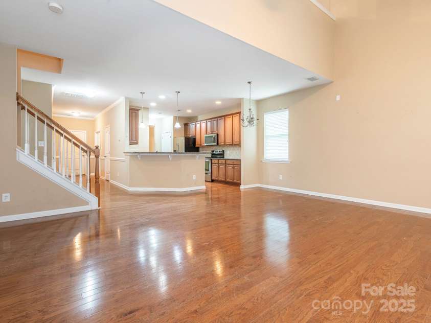 208 Fielding Street, Mount Holly, NC 28120.  MLS# CAR4249578, YatesRealty ID 8769. Living Room and Kitchen