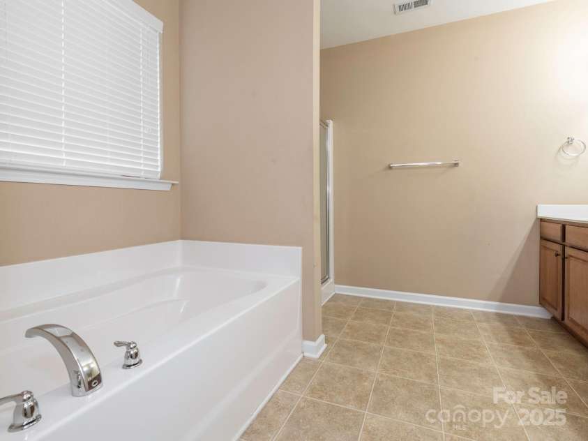 208 Fielding Street, Mount Holly, NC 28120.  MLS# CAR4249578, YatesRealty ID 8769. Primary Bathroom