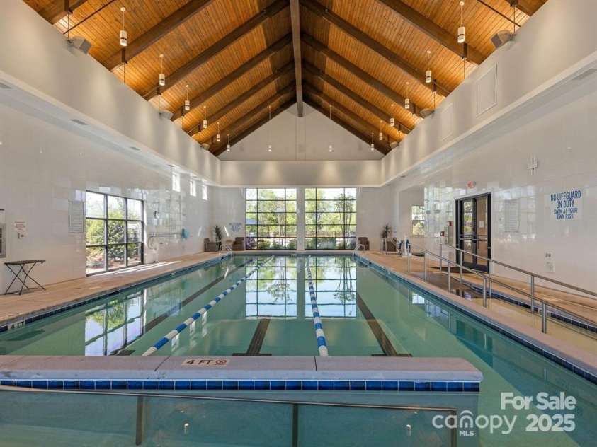 758 Peach Valley Lane, Fort Mill, SC 29715.  MLS# CAR4307389, YatesRealty ID 8771. The inside pool