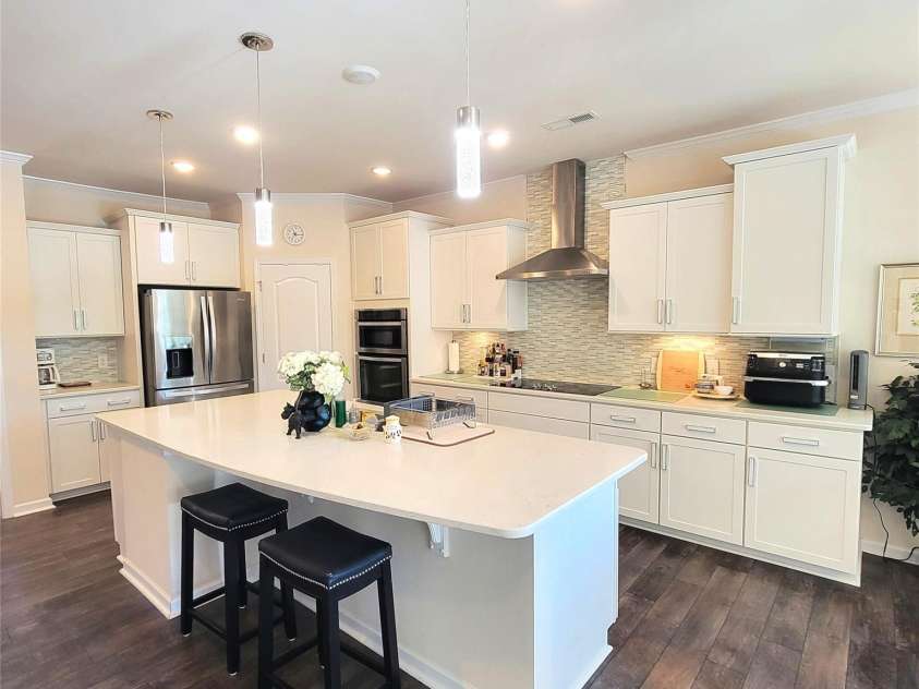 758 Peach Valley Lane, Fort Mill, SC 29715.  MLS# CAR4307389, YatesRealty ID 8771. This 'Chef's Dream Kitchen' has been thoughtfully designed with everything that makes cooking and entertaining a joy! You'll have a huge center island with lots of 'working'  and serving countertop space, loads of cab