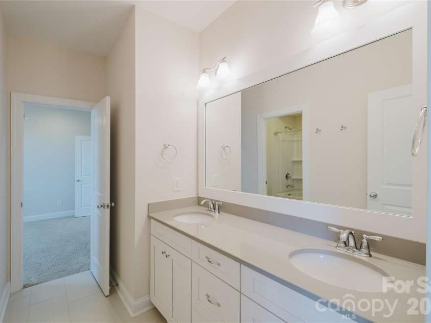 15431 Cimarron Hills Lane, Charlotte, NC 28278.  MLS# CAR4298385, YatesRealty ID 8774. LOWER BATHROOM
