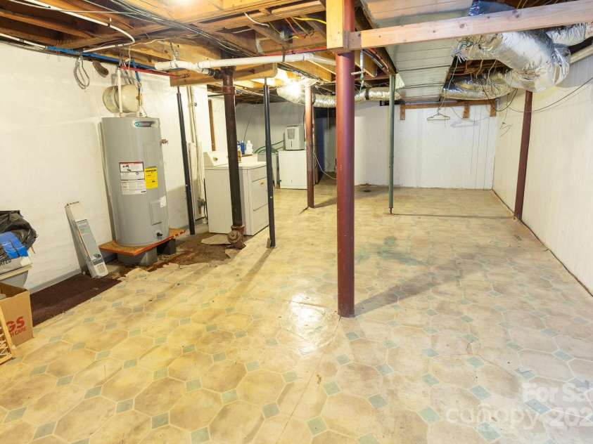 65 Oakley Road, Asheville, NC 28803.  MLS# CAR4249516, YatesRealty ID 8786. One Half of Basement