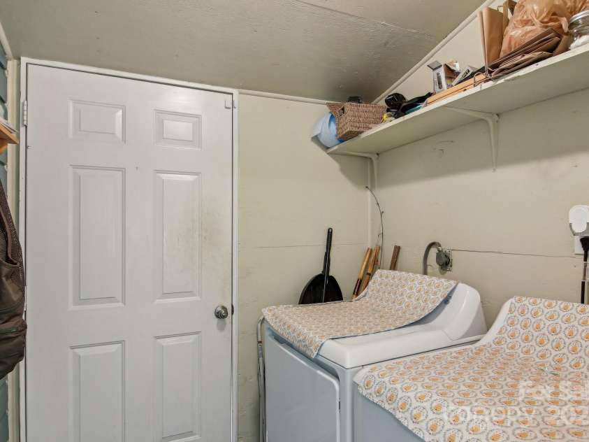 953 Howard Street, Tryon, NC 28782.  MLS# CAR4248154, YatesRealty ID 8790. Laundry room