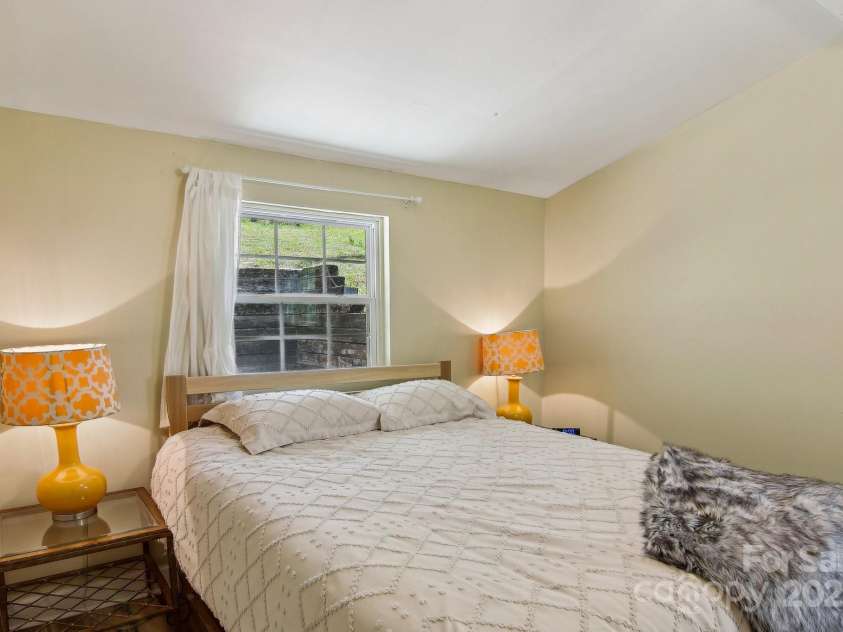 953 Howard Street, Tryon, NC 28782.  MLS# CAR4248154, YatesRealty ID 8790. Primary Bedroom