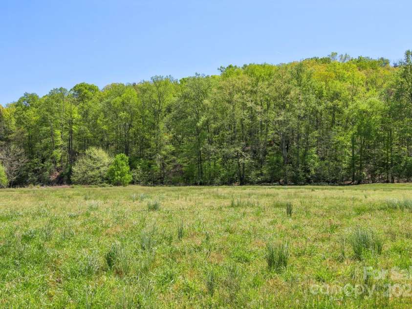 953 Howard Street, Tryon, NC 28782.  MLS# CAR4248154, YatesRealty ID 8790. Ziglar Field just across the street from the property