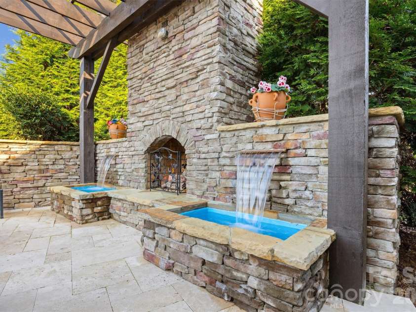 1045 Chippenham Avenue, Lancaster, SC 29720.  MLS# CAR4361759, YatesRealty ID 8794. Fireplace with waterfalls