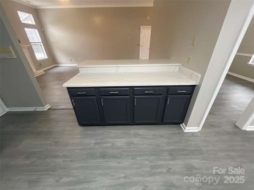 12042 Mallard Ridge Drive, Charlotte, NC 28269.  MLS# CAR4298005, YatesRealty ID 88. Kitchen View into the Living Room