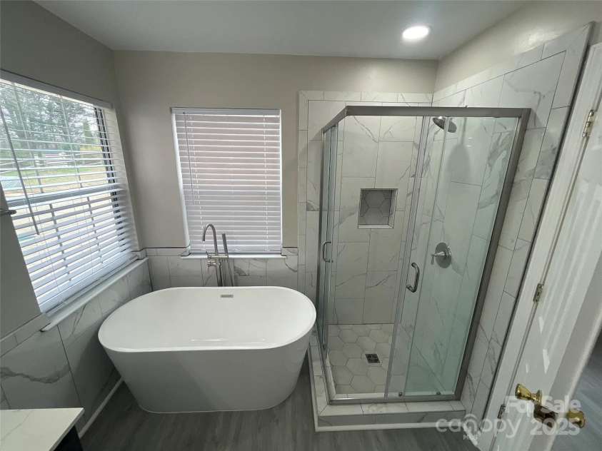 12042 Mallard Ridge Drive, Charlotte, NC 28269.  MLS# CAR4298005, YatesRealty ID 88. Primary Bathroom