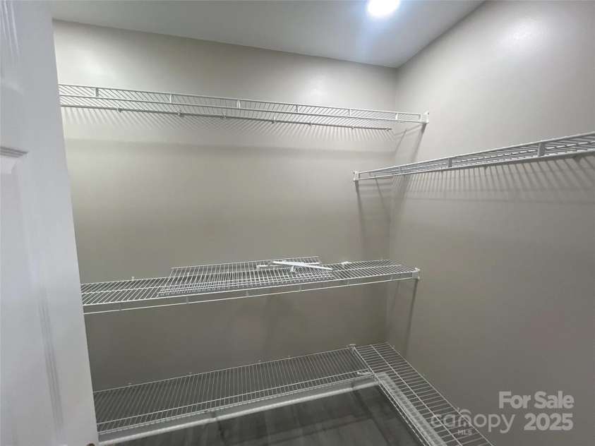 12042 Mallard Ridge Drive, Charlotte, NC 28269.  MLS# CAR4298005, YatesRealty ID 88. Primary Bedroom Walk in Closet