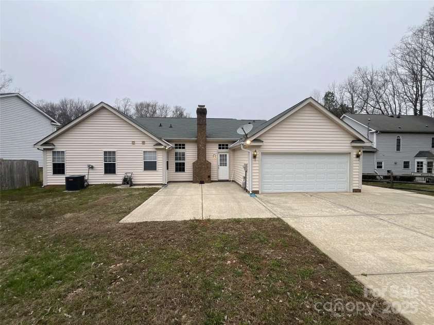 12042 Mallard Ridge Drive, Charlotte, NC 28269.  MLS# CAR4298005, YatesRealty ID 88. Rear of the Home, including Garage