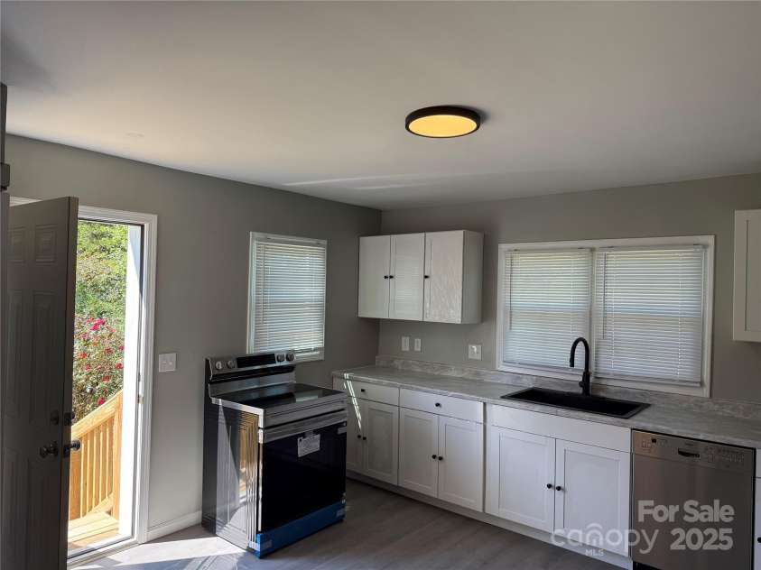 835 & 837 Sikes Mill Road, Monroe, NC 28110.  MLS# CAR4307157, YatesRealty ID 88. 837 Kitchen