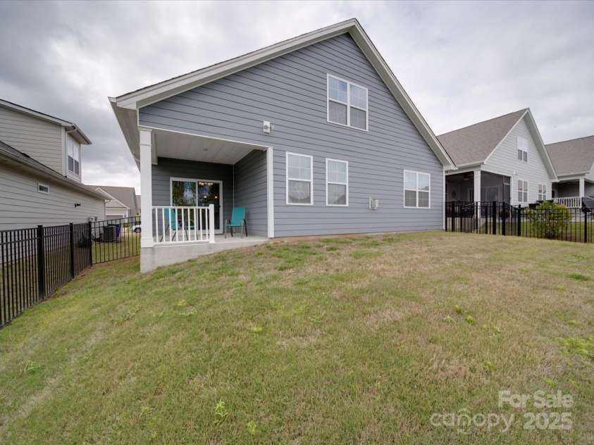 4027 Gozzi Drive, Iron Station, NC 28080.  MLS# CAR4251006, YatesRealty ID 8802. Fenced back yard