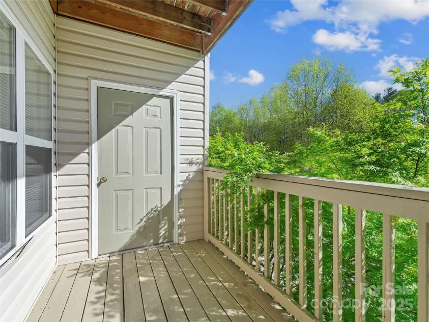 406 Carrington Place, Arden, NC 28704.  MLS# CAR4248260, YatesRealty ID 8804. Storage Closet off Covered Porch