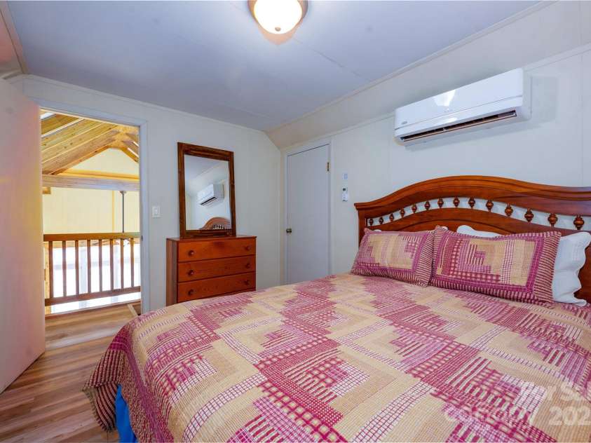 561 Deals Gap Road, Robbinsville, NC 28771.  MLS# CAR4144859, YatesRealty ID 8805. Loft Bedroom