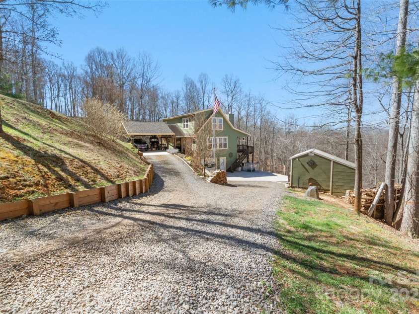 36 Crest Line Drive, Green Mountain, NC 28740.  MLS# CAR4237025, YatesRealty ID 8809. Entrance to the home