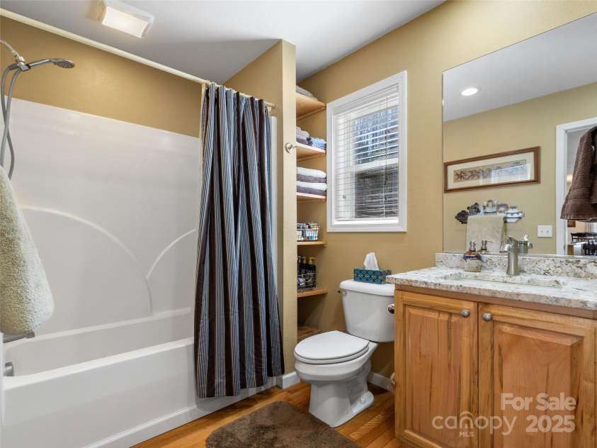 36 Crest Line Drive, Green Mountain, NC 28740.  MLS# CAR4237025, YatesRealty ID 8809. Full bath downstairs