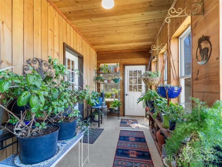36 Crest Line Drive, Green Mountain, NC 28740.  MLS# CAR4237025, YatesRealty ID 8809. Ground patio area