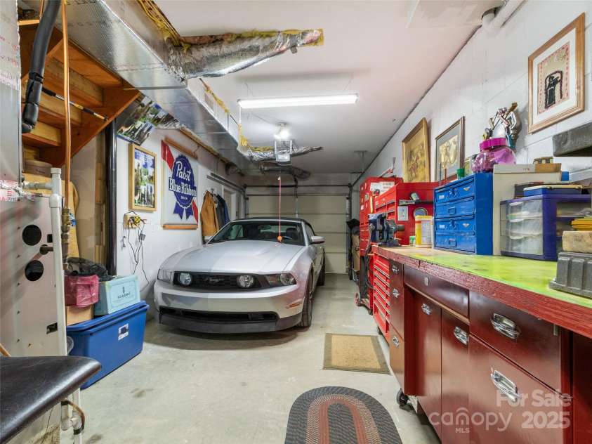 36 Crest Line Drive, Green Mountain, NC 28740.  MLS# CAR4237025, YatesRealty ID 8809. Heated Garage