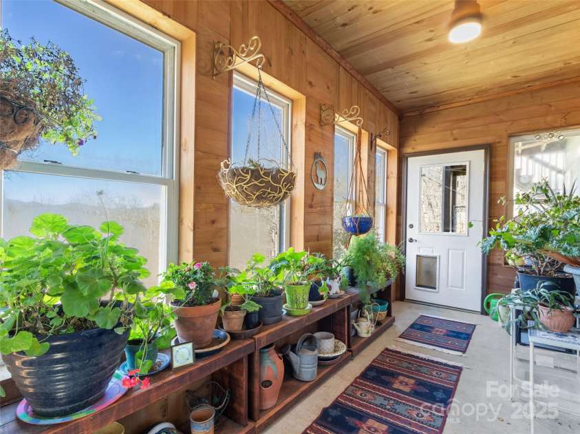 36 Crest Line Drive, Green Mountain, NC 28740.  MLS# CAR4237025, YatesRealty ID 8809. Sunroom