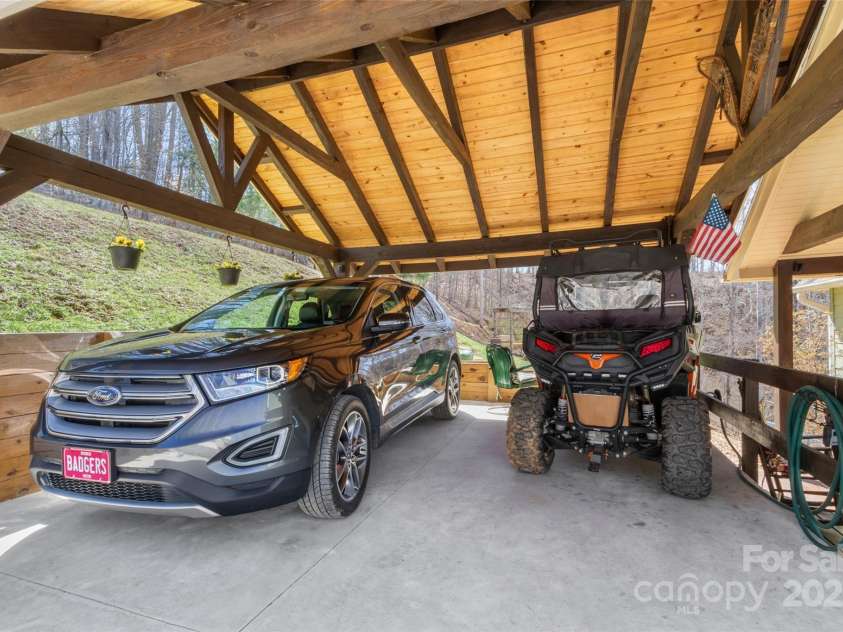 36 Crest Line Drive, Green Mountain, NC 28740.  MLS# CAR4237025, YatesRealty ID 8809. Timber framed carport
