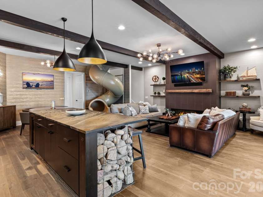 16407 Jetton Road, Cornelius, NC 28031.  MLS# CAR4326392, YatesRealty ID 881. Slide Room - Main Floor Bar & Entertainment Area